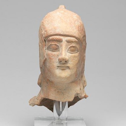A cypriot head from a pottery statue
