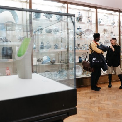 A highlight image for Two people standing in the galleries