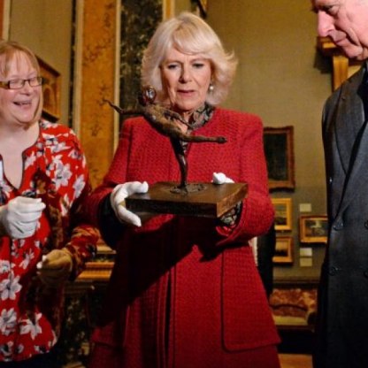 Dr Vicky Avery shows a Degas model to the Royal couple